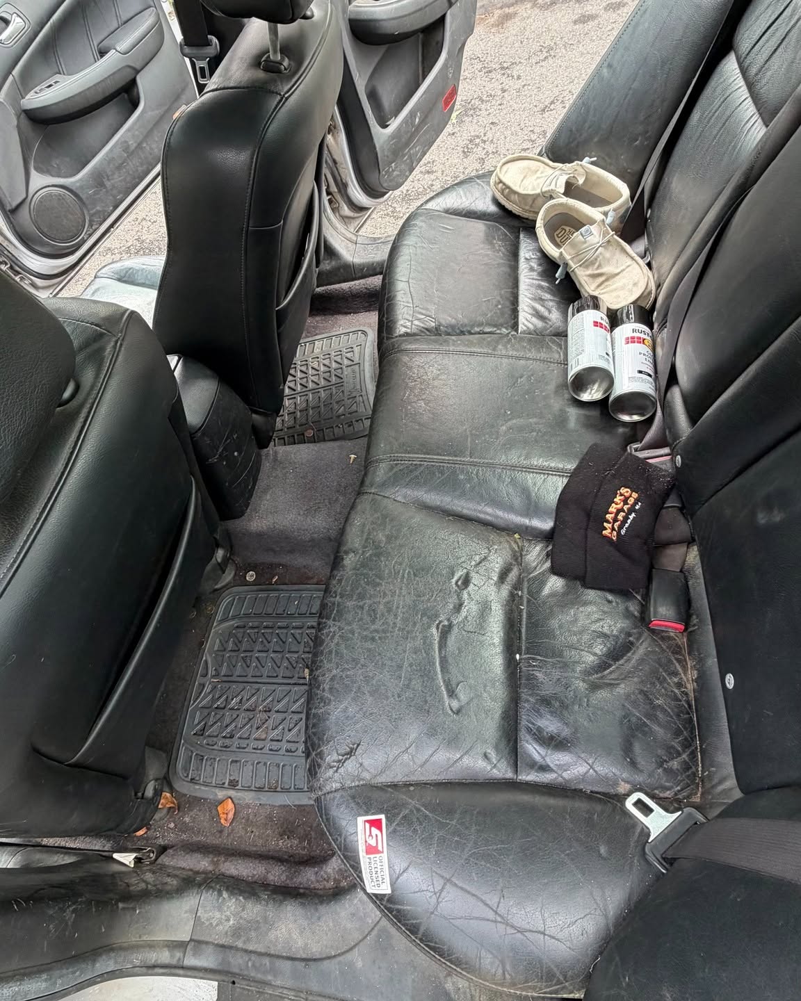 Rear leather seats and floor before interior detailing
